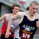 Soldotna’s James Innes runs just ahead of Wasilla’s Tim Grisso in the boys 400 meters during the preliminaries of the Region 3 track and field meet Friday, May 19, 2023, at Palmer High School in Palmer, Alaska. (Jeremiah Bartz/Frontiersman)
