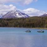 Contestants race down the Kenai River during the 16th Annual Cooper Landing Drift Boat Regatta near the Eagle Landing Resort in Cooper Landing, Alaska, on Saturday, May 20, 2023. (Jake Dye/Peninsula Clarion)