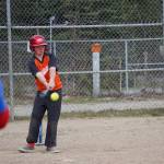 Paxton Katzenberger takes a swing at the ball in Soldotna Little League Challenger Program play at the Little League Fields in Soldotna, Alaska on Saturday, May 20, 2023. (Jake Dye/Peninsula Clarion)