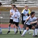 The Kenai Central boys soccer team celebrates victory Saturday, May 20, 2023, in the championship game of the Peninsula Conference tournament at Justin Maile Field at Soldotna High School in Soldotna, Alaska. (Photo by Jeff Helminiak/Peninsula Clarion)