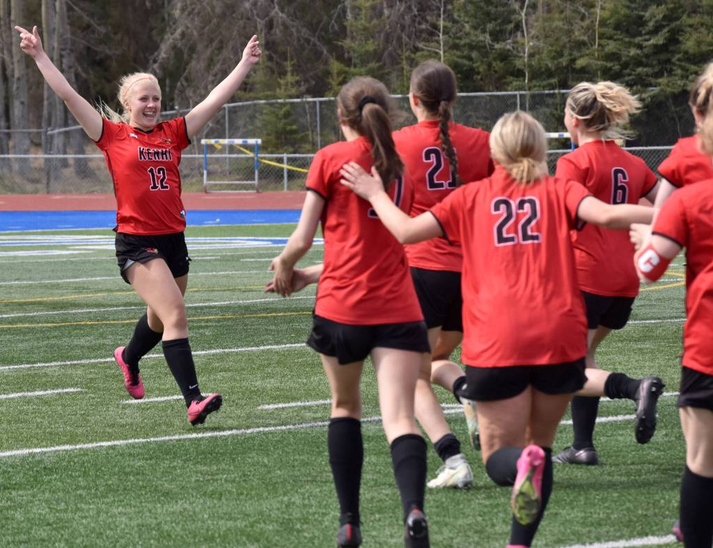 Kenai Centrals Kate Wisnewski celebrates making the game-winning penalty kick on Saturday, May 20, 2023, in the championship game of the Peninsula Conference tournament at Justin Maile Field at Soldotna High School in Soldotna, Alaska. (Photo by Jeff Helminiak/Peninsula Clarion)