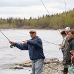 Dave Atcheson demonstrates fly casting into the Kenai River to a crowd of middle schoolers during a kids camp put on by Trout Unlimited on Wednesday, May 24, 2023, at the Donald E. Gilman Kenai River Center in Soldotna, Alaska. (Jake Dye/Peninsula Clarion)