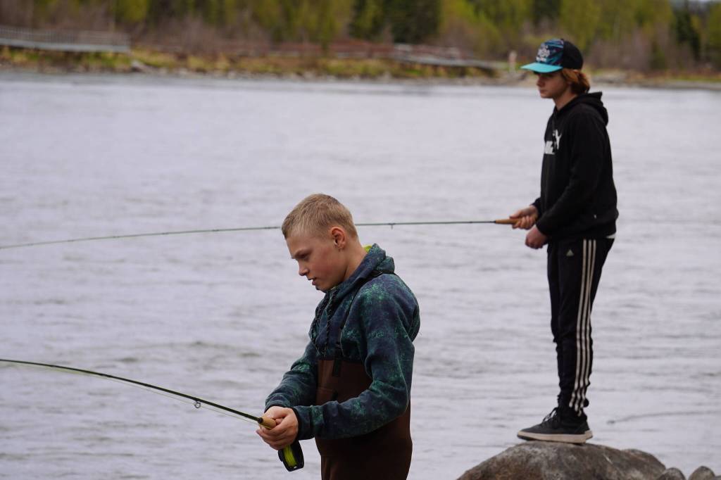 Middle schoolers practice fly casting into the Kenai River during a kids camp put on by Trout Unlimited on Wednesday, May 24, 2023, at the Donald E. Gilman Kenai River Center in Soldotna, Alaska. (Jake Dye/Peninsula Clarion)