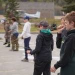 Middle schoolers practice fly casting in the parking lot of the Donald E. Gilman Kenai River Center in Soldotna, Alaska, during a kids camp put on by Trout Unlimited on Wednesday, May 24, 2023. (Jake Dye/Peninsula Clarion)