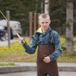 Middle schoolers practice fly casting in the parking lot of the Donald E. Gilman Kenai River Center in Soldotna, Alaska, during a kids camp put on by Trout Unlimited on Wednesday, May 24, 2023. (Jake Dye/Peninsula Clarion)