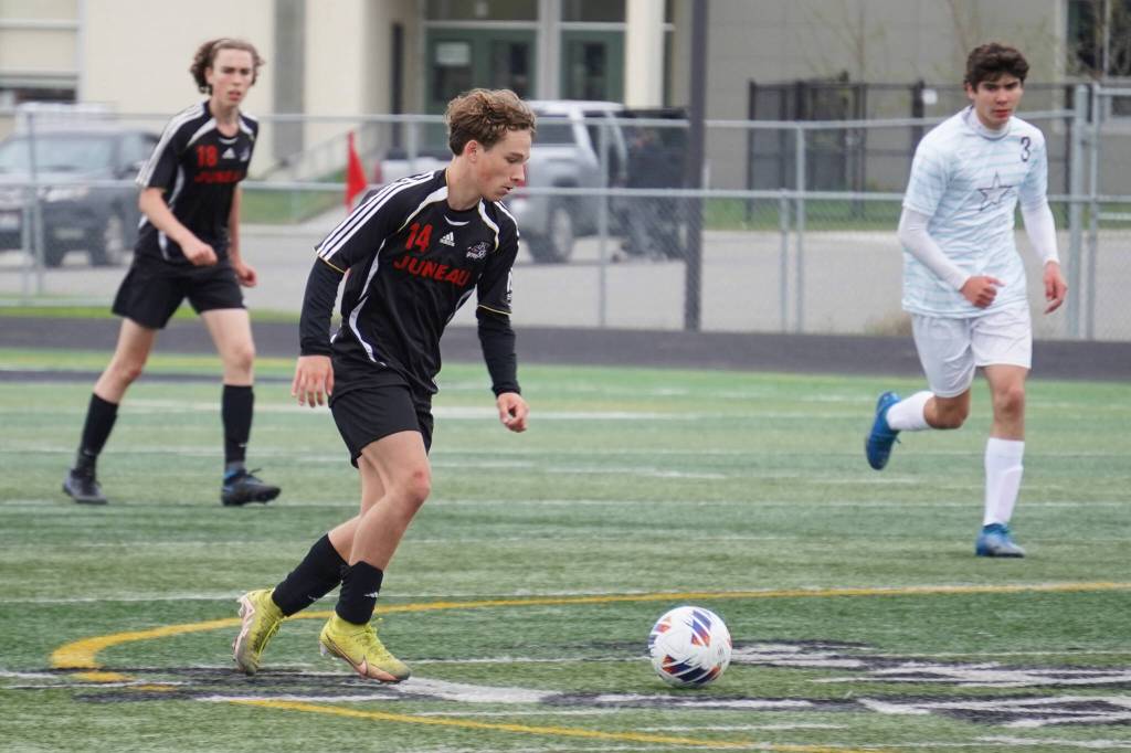 Juneau-Douglas Kai Ciambor moves at the ball during the Division II Soccer State Championship on Saturday, May 27, 2023, at West Anchorage High School in Anchorage, Alaska. (Jake Dye/Peninsula Clarion)
