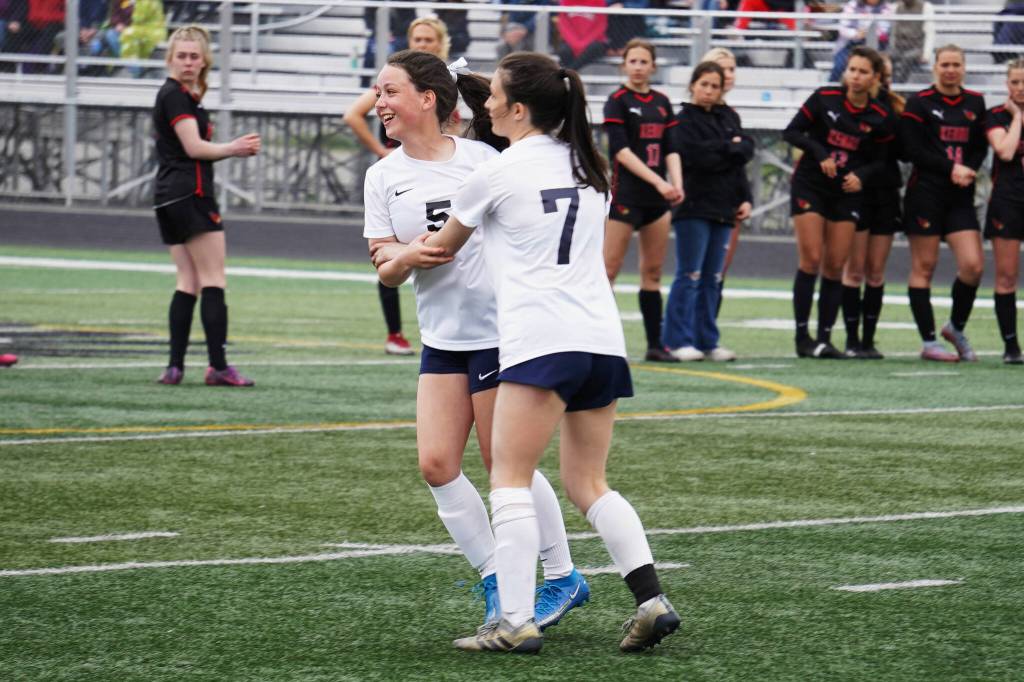 Soldotnas Piper Bloom celebrates with Bay Bloom after Bay scored a goal during the Division II Soccer State Championship on Saturday, May 27, 2023, at West Anchorage High School in Anchorage, Alaska. (Jake Dye/Peninsula Clarion)