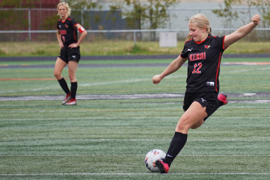 Kenai Centrals Kate Wisnewski prepares for a big kick during the Division II Soccer State Championship on Saturday, May 27, 2023, at West Anchorage High School in Anchorage, Alaska. (Jake Dye/Peninsula Clarion)