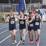 Homers Seamus McDonough, Lukyan Dax, Jonah Mershon and Lance Seneff celebrate winning the Division II 1,600-meter relay Saturday, May 27, 2023, at the state track and field meet at Palmer High School in Palmer, Alaska. (Photo by Jeff Helminiak/Peninsula Clarion)