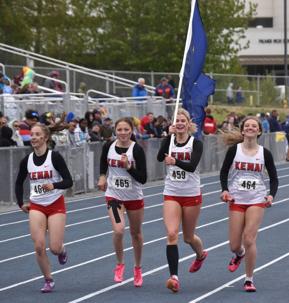 Kenais Centrals Sierra Hershberger, Emilee Wilson, Malena Grieme and Sophie Tapley celebrate victory in the Division I 400 relay Saturday, May 27, 2023, at the state track and field meet at Palmer High School in Palmer, Alaska. (Photo by Jeff Helminiak/Peninsula Clarion)