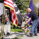 Wreaths are placed honoring fallen soldiers during a Memorial Day ceremony on Monday, May 29, 2023, at Leif Hanson Memorial Park in Kenai, Alaska. (Jake Dye/Peninsula Clarion)