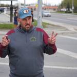 Soldotna Parks & Rec Director Joel Todd leads a party of transportation professionals on a tour of the Sterling Highway and Birch Avenue intersection in Soldotna, Alaska, on Monday, May 22, 2023. (Jake Dye/Peninsula Clarion)