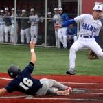 Soldotnas Easton Hawkins slides into home underneath Palmer pitcher Reed Craner during SoHis six-run first inning of its Division II state quarterfinal game against the Moose Thursday, June 1, 2023, at Wasilla High School. (Jeremiah Bartz/Frontiersman)