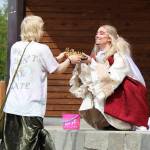 Drag performer Jasper Dragful accepts a crown after speaking about the history of drag during Soldotna Pride in the Park on Saturday, June 3, 2023 in Soldotna, Alaska. (Ashlyn OHara/Peninsula Clarion)