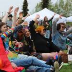 Soldotna Pride in the Park attendees wave their hands during a drag performance at Soldotna Creek Park on Saturday, June 3, 2023 in Soldotna, Alaska. (Ashlyn OHara/Peninsula Clarion)