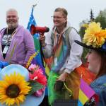 David Brighton (left) and Leslie Byrd (right) prepare to lead marchers from the Soldotna Regional Sports Complex to Soldotna Creek Park as part of Soldotna Pride in the Park on Saturday, June 3, 2023 in Soldotna, Alaska. (Ashlyn OHara/Peninsula Clarion)