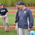 Soldotna head coach Ken Gibson (center) and assistant Charles Mickelson laugh after escaping a celebratory dump of ice water, but Easton Hawkins still celebrates after the Division II state championship game Saturday, June 4, 2023, at Wasilla High School in Wasilla, Alaska. (Photo by Jeff Helminiak/Peninsula Clarion)