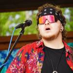 Ben Sayers performs as part of Blackwater Railroad Company during the Levitt AMP Soldotna Music Series on Wednesday, June 7, 2023, at Soldotna Creek Park in Soldotna, Alaska. (Jake Dye/Peninsula Clarion)