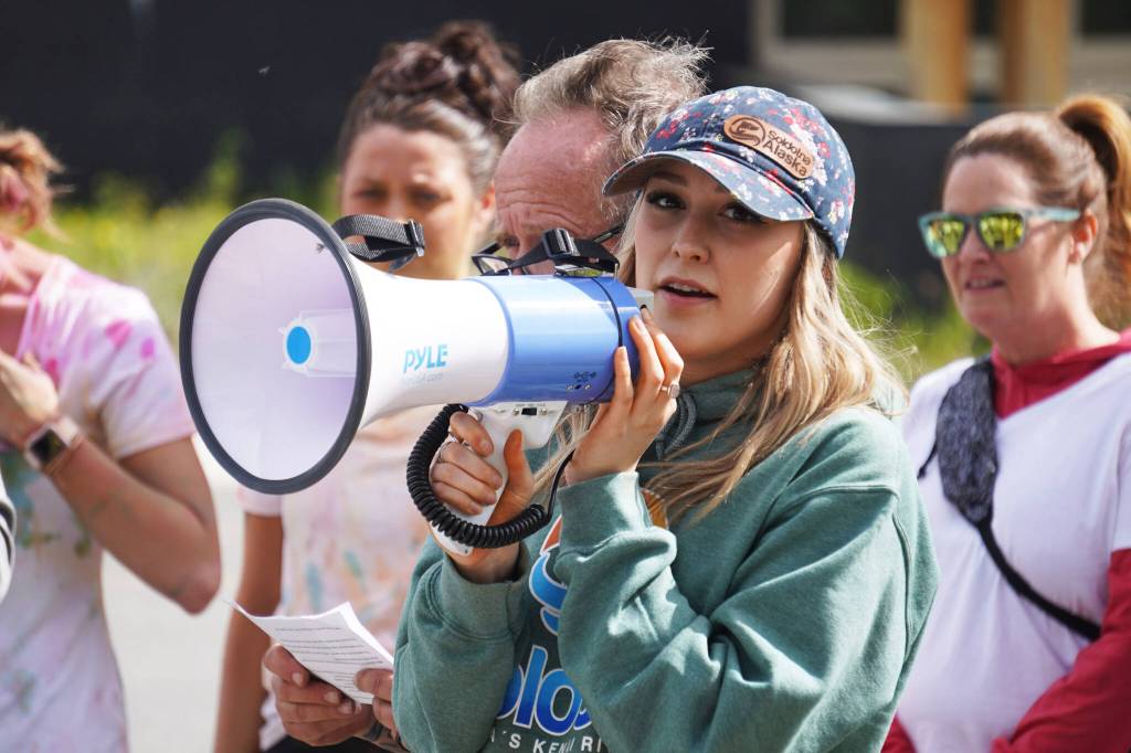 Soldotna Chamber of Commerce Executive Director Maddy McElrea speaks during a color run held as part of during the Levitt AMP Soldotna Music Series on Wednesday, June 7, 2023, at the Kenai National Wildlife Refuge Visitors Center in Soldotna, Alaska. (Jake Dye/Peninsula Clarion)