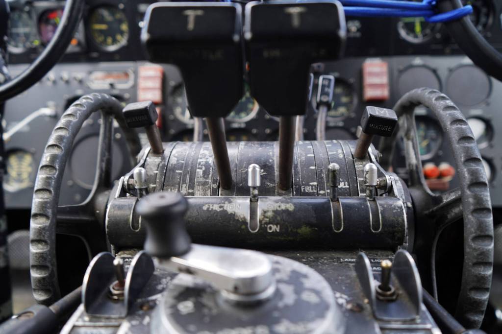 Aged controls are seen inside a large plane displayed at the Kenai Peninsula Air Fair on Saturday, June 10, 2023, at the Kenai Municipal Airport in Kenai, Alaska. (Jake Dye/Peninsula Clarion)