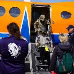 Attendees tour a plane displayed at the Kenai Peninsula Air Fair on Saturday, June 10, 2023, at the Kenai Municipal Airport in Kenai, Alaska. (Jake Dye/Peninsula Clarion)