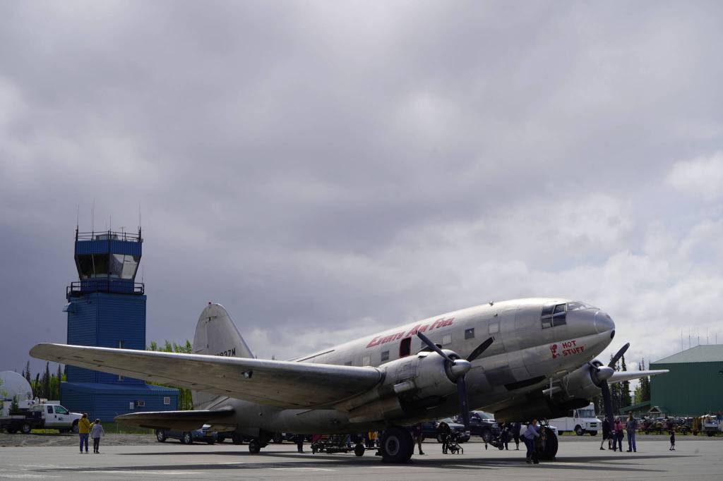A large plane rests on the runway at the Kenai Peninsula Air Fair on Saturday, June 10, 2023, at the Kenai Municipal Airport in Kenai, Alaska. (Jake Dye/Peninsula Clarion)