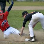 Derrick Jones of the American Legion Twins is tagged out by West third baseman Jack Boots on a steal attempt Sunday, June 11, 2023, at the Soldotna Little League fields in Soldotna, Alaska. (Photo by Jeff Helminiak/Peninsula Clarion)