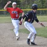 American Legion Twins second baseman Trenton Ohnemus chases Wests Jack Boots in a rundown Sunday, June 11, 2023, at the Soldotna Little League fields in Soldotna, Alaska. (Photo by Jeff Helminiak/Peninsula Clarion)