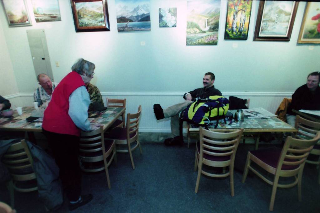Robert Summer visits with other folks at Kaladi Brothers in Soldotna, Alaska, in November 2004. (M. Scott Moon/Peninsula Clarion file)