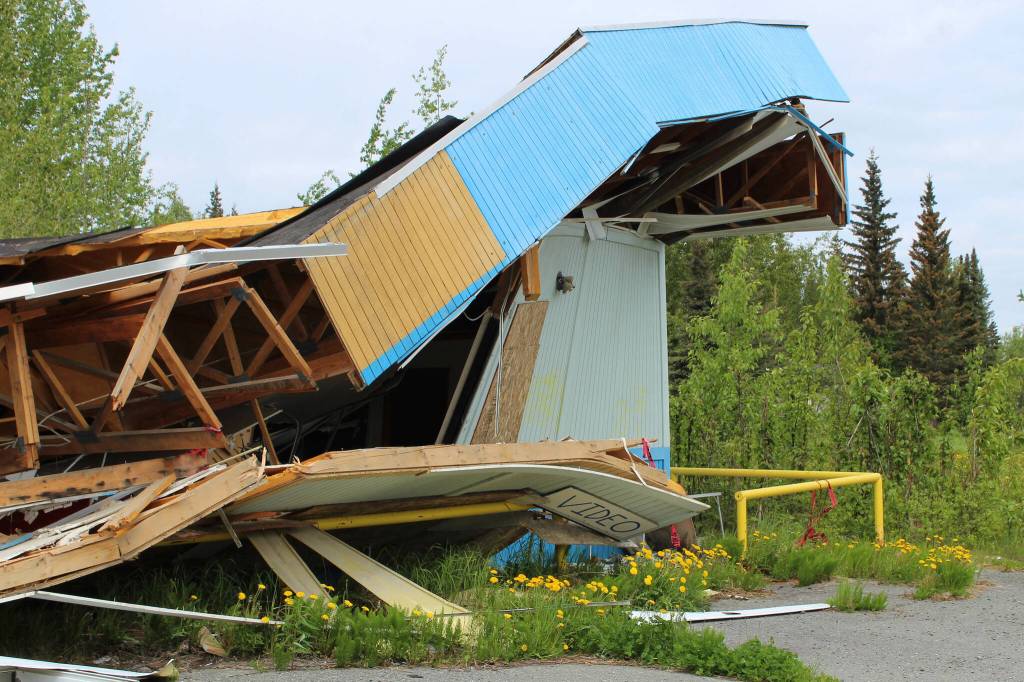Building materials pile up at the site of the former ZipMart on Wednesday, June 14, 2023, in Sterling, Alaska. (Ashlyn OHara/Peninsula Clarion)