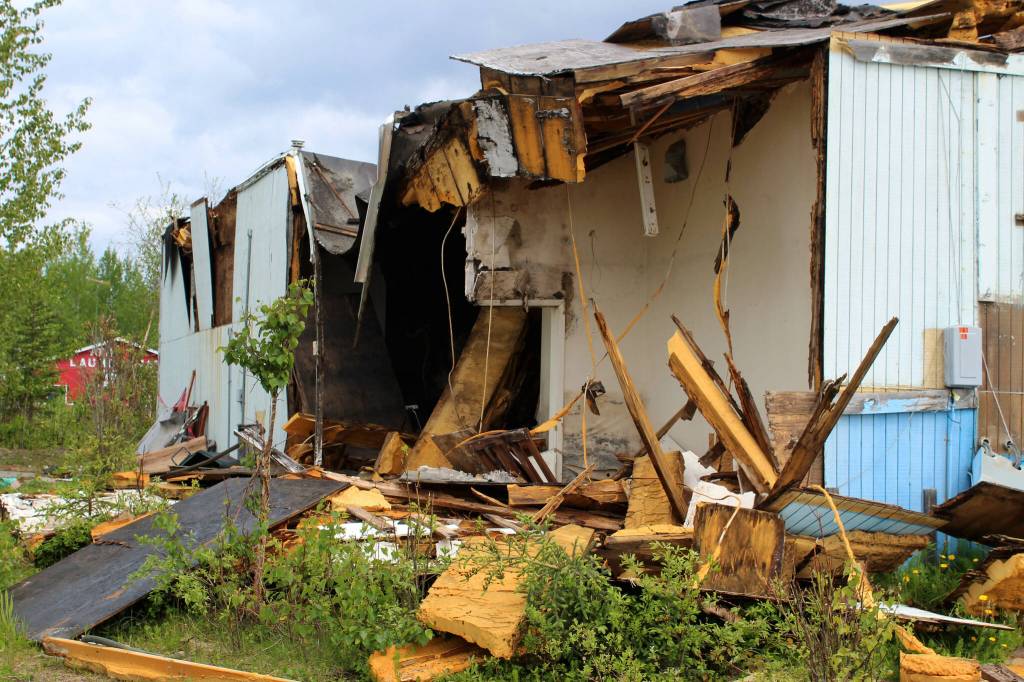 Building materials pile up at the site of the former ZipMart on Wednesday, June 14, 2023, in Sterling, Alaska. (Ashlyn OHara/Peninsula Clarion)