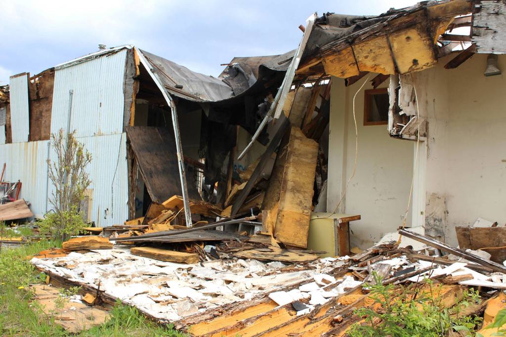 Building materials pile up at the site of the former ZipMart on Wednesday, June 14, 2023, in Sterling, Alaska. (Ashlyn OHara/Peninsula Clarion)