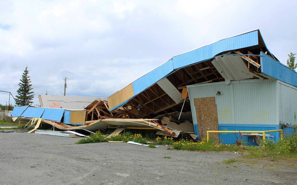 Building materials pile up at the site of the former ZipMart on Wednesday, June 14, 2023, in Sterling, Alaska. (Ashlyn OHara/Peninsula Clarion)