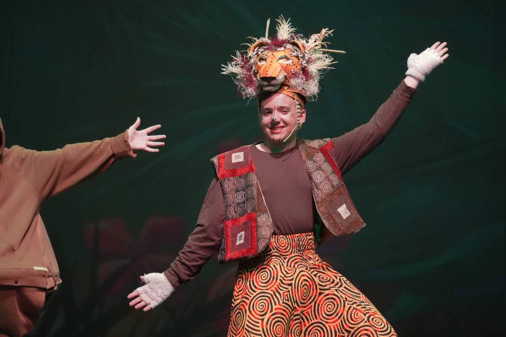 Jackson Hooper portrays Simba during a rehearsal of The Lion King Jr. in the Renee C. Henderson Auditorium in Kenai, Alaska, on Tuesday, June 6, 2023. (Jake Dye/Peninsula Clarion)