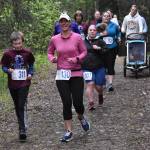 Conner Morris and Kylie Morris lead a pack of runners at the Run for the River on Saturday, June 10, 2023, in Soldotna, Alaska. (Photo by Jeff Helminiak/Peninsula Clarion)