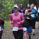 Conner Morris and Kylie Morris lead a pack of runners at the Run for the River on Saturday, June 10, 2023, in Soldotna, Alaska. (Photo by Jeff Helminiak/Peninsula Clarion)