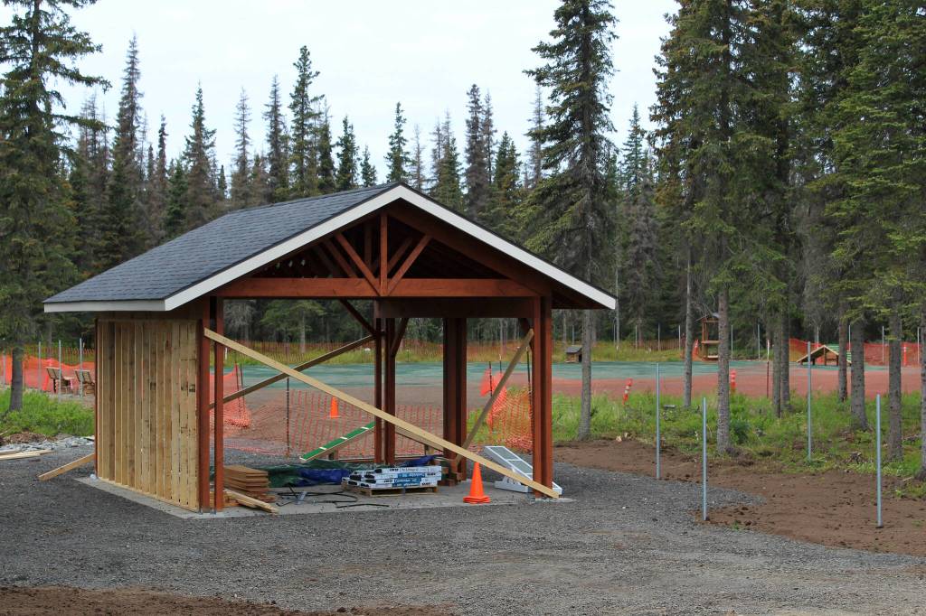A pavillion under construction marks the entrance to the future Kenai Dog Park on Wednesday, June 14, 2023, in Kenai, Alaska. (Ashlyn OHara/Peninsula Clarion)