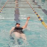 Jess Gilbert swims the 100-meter backstroke at the 2023 Special Olympics Alaska Summer Games at Dimond High School in Anchorage, Alaska. (Photo provided by Special Olympics Alaska Central Peninsula)