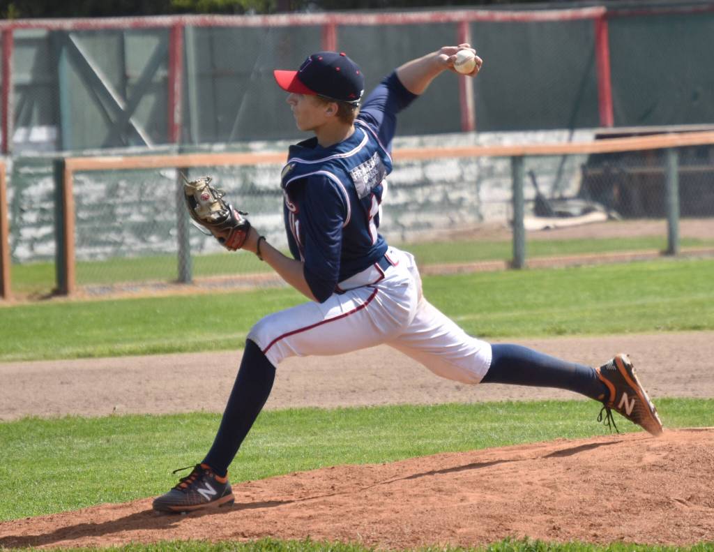 Wasilla Road Warriors Jaren Venie picks up the save against the American Legion Twins on Sunday, June 18, 2023, at Coral Seymour Memorial Park in Kenai, Alaska. (Photo by Jeff Helminiak/Peninsula Clarion)