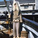 Photo courtesy of the Fenger Family Collection
Posing stiffly in the bow of the M.S. Hygiene, along the Alaska coast, is Nurse Grace Heutink, clad in a warm fur parka.