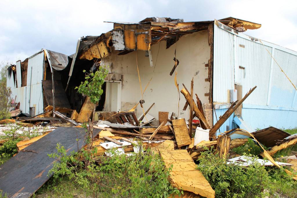 Building materials pile up at the site of the former ZipMart on Wednesday, June 14, 2023, in Sterling, Alaska. (Ashlyn OHara/Peninsula Clarion)
