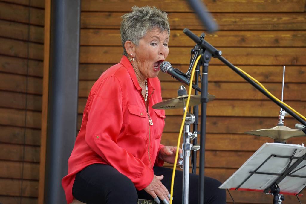 Connie Brannock, part of Connie Brannocks Tiny House of Funk, performs during the Soldotna Music Series at Soldotna Creek Park in Soldotna, Alaska, on Wednesday, June 21, 2023. (Jake Dye/Peninsula Clarion)