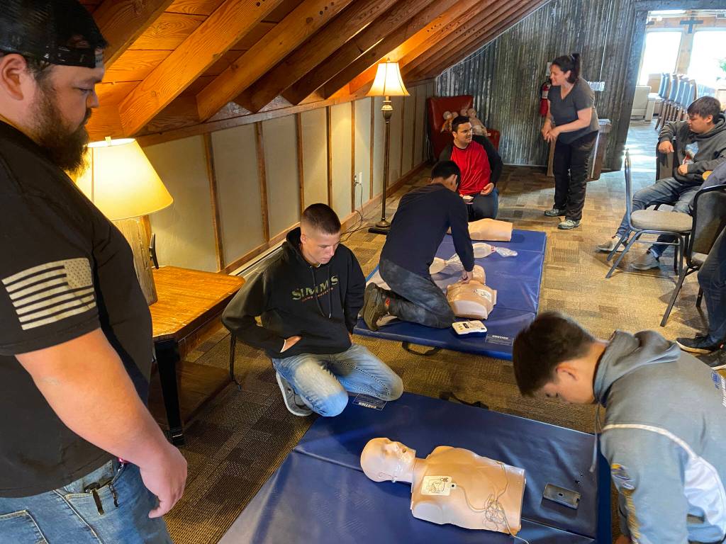 The interns working with Salamatof Tribe Duhdeldiht Youth Services participate in a first aid and CPR class. (Photo courtesy Michael Bernard)