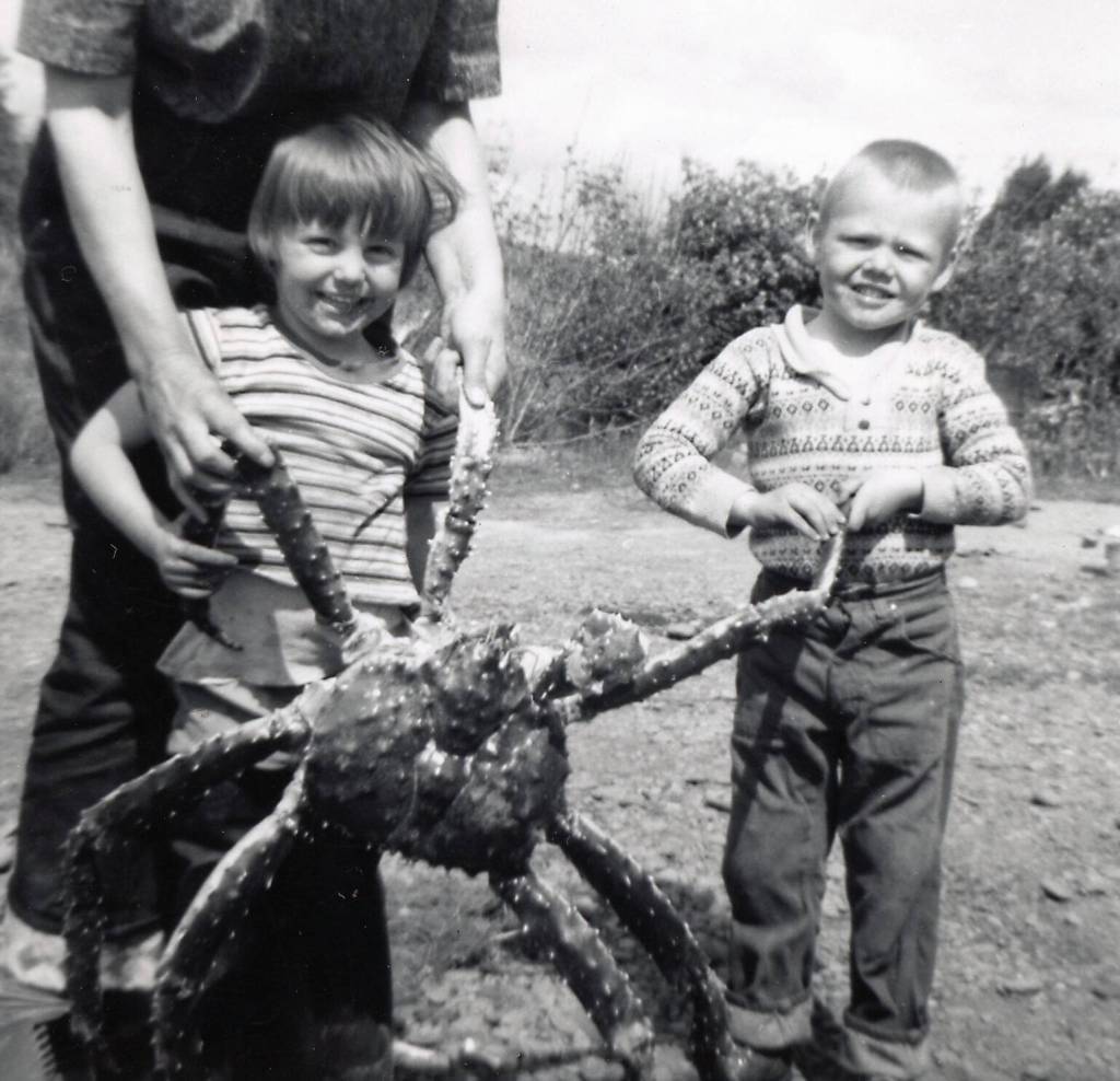 Grace, Heidi, live king crab, EricSeafood was another benefit of life in Homer. Pictured here in July 1961, Grace holds a live king crab, with assistance from daughter Heidi and son Eric. (Photo courtesy of the Fenger Family Collection)