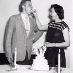 Newly married John and Grace Fenger have a good-natured exchange of wedding cake. They were married in Kodiak during one of the M.S. Hygienes ports of call. (Photo courtesy of the Fenger Family Collection)