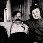 Charles Windy Wagner, in his later years, and an unknown woman smile for the camera in Wagners Kenai River cabin. (Photo courtesy of the Knackstedt Collection)