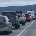 Traffic is backed up on the Homer Spit late Friday afternoon on June 20, 2023, in Homer, Alaska, while Homer Police and Homer Volunteer Fire Department staff respond to a tourist injured when she was hit by a car that veered onto the bike trail. (Photo by Christina Whiting/Special to the Homer News).