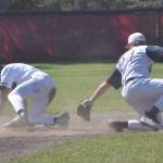 Easton Marshall of Lower Columbia (Washington) Baseball Club slides past Legion Twins second baseman Andrew Pieh on Saturday, July 1, 2023, at the Kenai Little League fields. (Photo by Jeff Helminiak/Peninsula Clarion)