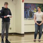 Boden White (left) talks to attendees about his experience participating in KPBSDs Summer Work Program during a program celebration at Soldotna High School on Thursday, June 29, 2023 in Soldotna, Alaska. (Ashlyn OHara/Peninsula Clarion)