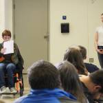 Attendees listen to Coen Braxling (left) talk about his experience participating in KPBSDs Summer Work Program during a celebration event at Soldotna High School on Thursday, June 29, 2023 in Soldotna, Alaska. (Ashlyn OHara/Peninsula Clarion)